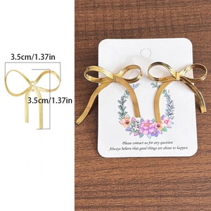 Elegant 18K gold plated stainless steel bow earrings with long tassel chain style