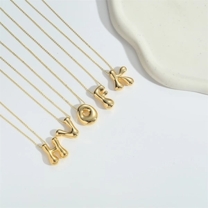 Luxury 3D bubble letter pendant necklaces in gold finish with minimalist chain for women