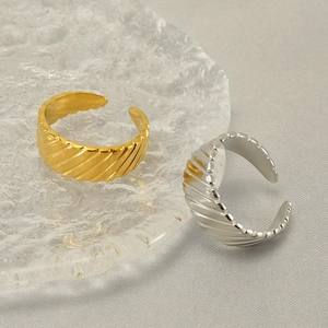 Adjustable striped stainless steel rings in gold and silver finish for women