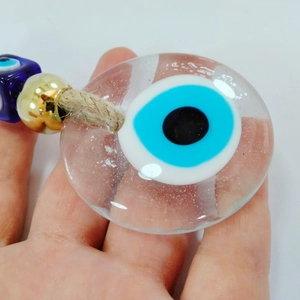 Turkish Blue Evil Eye glass ornament with golden bead and jute rope for wall decor