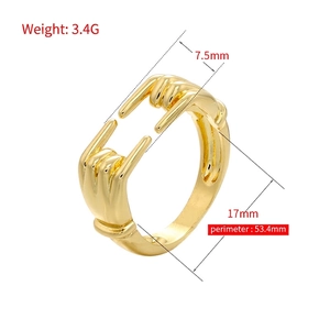 Polished adjustable open ring featuring rock-on hand gesture design in gold finish