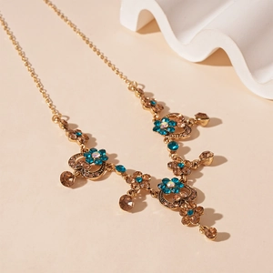 Vintage gold necklace with blue crystal flowers and amber teardrop pendants
