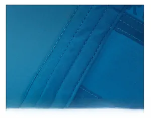 Macro shot of wide sweatband inside the blue baseball cap with fine double stitching