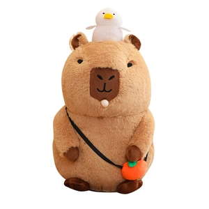 Cute brown capybara plush toy with a white bird on head and an orange shoulder bag