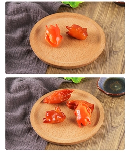 Macro detail of realistic roasted duck food model with glossy finish on a wooden plate