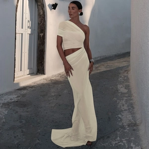 Detail showing elegant ivory white mesh paneling and side cutouts on this trendy dress