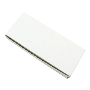 Close-up of a sturdy white corrugated cardboard packaging box for manicure tools