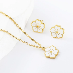 Vintage stainless steel floral jewelry set with cherry blossom pendant and earrings