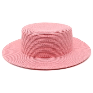 Flat top pink woven straw boater hat with wide brim for summer beach vacation