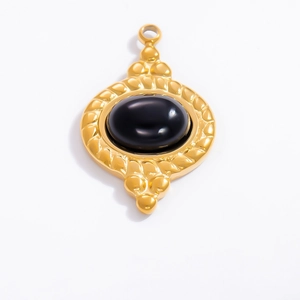 Macro view of 18k gold plated stainless steel pendant with oval black obsidian gemstone