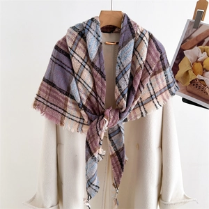 Detailed view of checkered cashmere-feel scarf with fringes in purple and blue tones