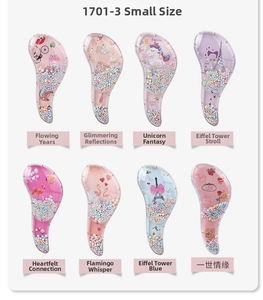 Detail of compact transparent detangling hairbrushes with colorful beads and cartoon patterns