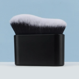 Macro detail of wave-shaped dual-tone bristles on a flat foundation brush for flawless makeup