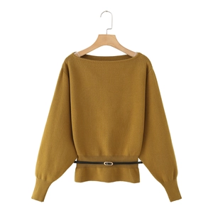 Women's mustard green boat neck knit sweater with batwing sleeves and black waist belt
