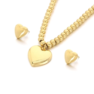 Golden heart jewelry set including a beaded necklace and matching stud earrings