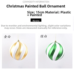 Detail view of 15cm Christmas painted ornaments in gold, green and white swirl patterns