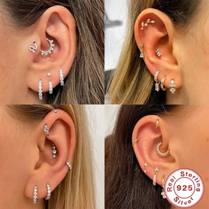 Detailed views of S925 sterling silver cartilage hoops with cubic zirconia stones