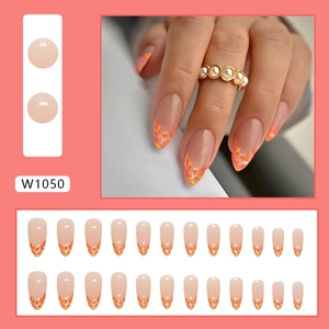 Autumn almond fake nails featuring orange glitter gradient and floral leaf designs