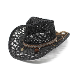 Western straw cowboy hat in black with ethnic geometric ribbon and tassel decoration