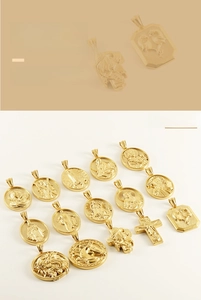Detailed relief of golden lion and religious pendants in 18K plated stainless steel