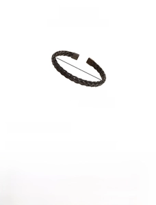 Detail of black twisted cable cuff bracelet in titanium steel with 58mm diameter