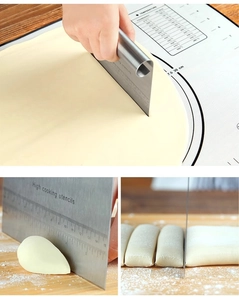 Detail view of stainless steel dough scraper with measurement scales for baking
