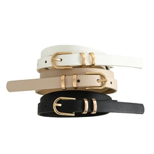 Three minimalist PU leather belts in white, beige, and black with gold square metal buckles