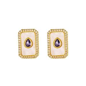 Detail of rectangular 18K gold earrings with purple gemstone and mother of pearl