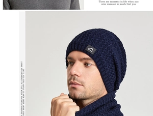 Close-up of dark blue thermal knitted hat and scarf set with soft honeycomb texture