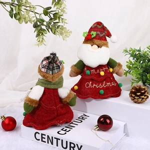 Plush Santa and reindeer holiday ornaments with Merry Christmas embroidery on red felt