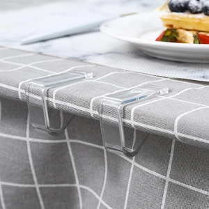 Transparent plastic tablecloth clips for non-slip table cover securing on dining table