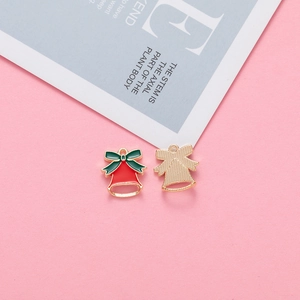 Detailed front and back view of a festive red and green Christmas bell alloy pendant
