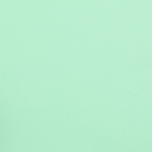 Détail macro du tissu de robe dos nu vert menthe montrant la texture tissée fine
