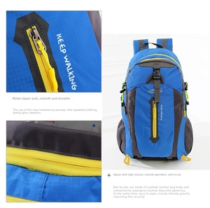 Detail showing durable fabric and high-quality metal zippers of the hiking backpack
