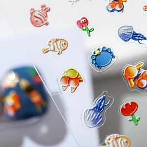 3D embossed nail stickers featuring colorful ocean creatures and floral beach party designs