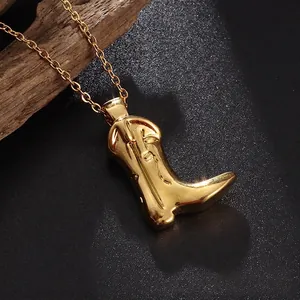 Classic gold cowboy boot pendant necklace on a polished metal chain for women