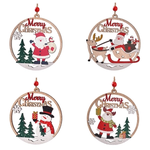 Set of four circular wooden Christmas ornaments with Santa Claus and reindeer carvings