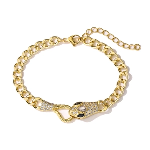Macro shot of 18K gold plated snake head bracelet featuring cubic zirconia pave setting