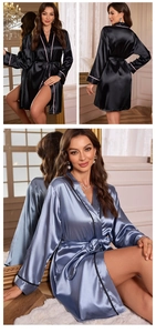 Detail of silk satin long bathrobe featuring contrast piping and waist tie closure