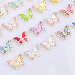 Colorful butterfly nail art charms with gold alloy base and sparkling rhinestones