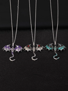 Detail of vintage hip hop dragon pendants with colorful wings and diamond accents