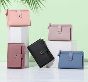 Short PU leather wallets in various colors displayed on white geometric stands with shadows