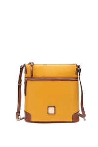 Close-up of yellow pebbled leather crossbody bag with brown trim and metal hardware