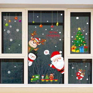 Colorful Christmas window stickers featuring Santa, reindeer, and Merry Christmas text