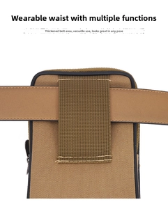 Detail of durable khaki canvas waist bag with reinforced belt loops for secure outdoor wear