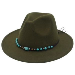 Dark green western cowboy hat with turquoise beaded band on a clean white background