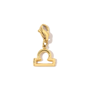 Detail of 14K gold plated Libra zodiac pendant with functional lobster clasp