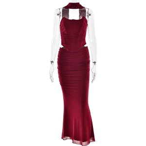 Detailed view of dark red two-piece set featuring a halter top and slim fit maxi skirt
