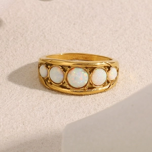 Elegant 18K gold plated stainless steel ring featuring five round opal stones