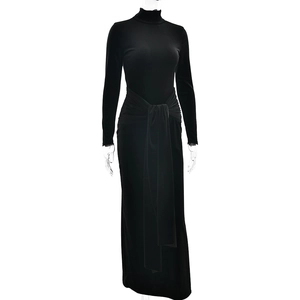 Close-up of long sleeve black bodycon dress with side drawstring and waist tie detail
